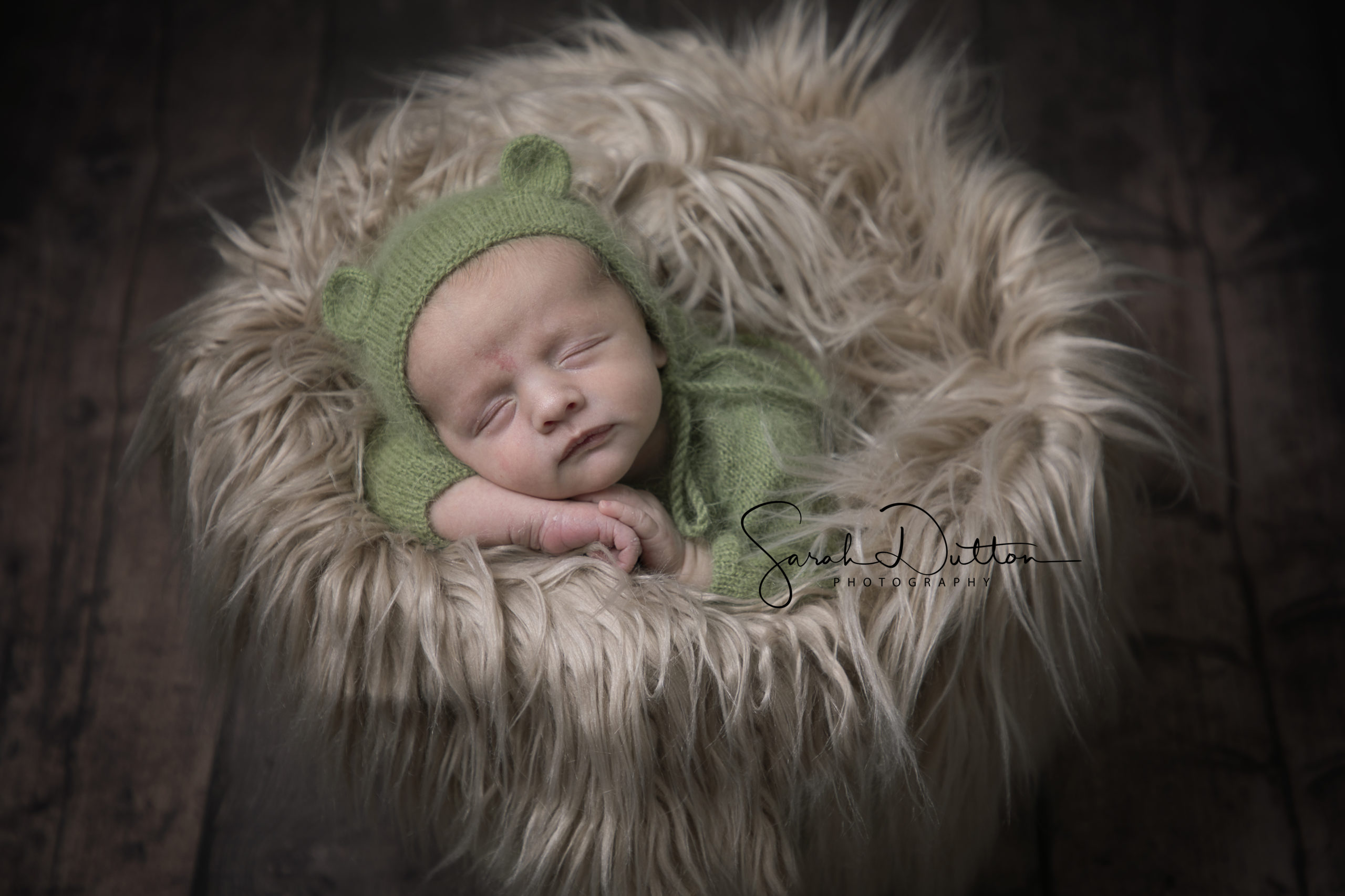 Newborn baby photographer image of a newborn baby taken in a studio in Whitchurch Hampshire by a professional photographer